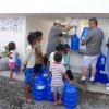 Filling water bottles in Ecuador
